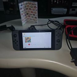 Nintendo switch with accessories and game