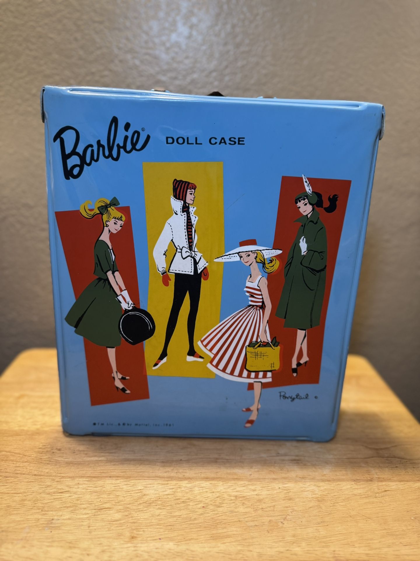 1961 Barbie Doll Case by Mattel featuring the classic “Ponytail” Barbie artwork. This vintage item is collectible, especially among Barbie and mid-cen