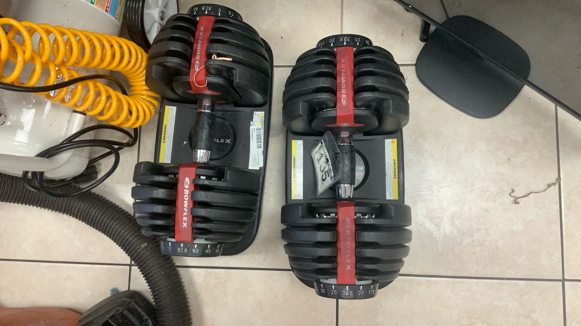 BOWFLEX Multiple Weight Dumb Bells.