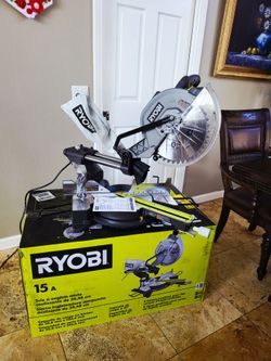 Ryobi brand new 15 Amp 12 in. Corded Sliding Compound Miter Saw with LED Cutline Indicator