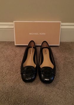 Michael Kors black flats with black MK buckle (NEW) size 7.