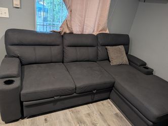 Couch that has a bed