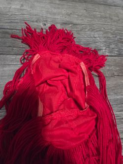 Red yarn wig