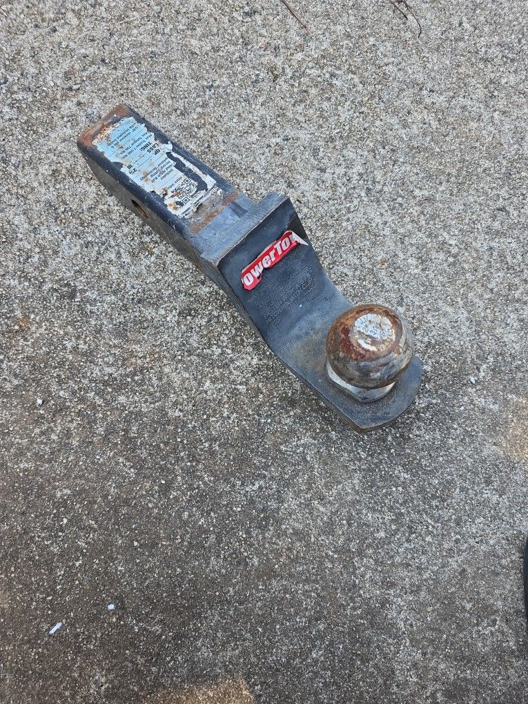 Trailer hitch ball mount with a 2-inch hitch ball.