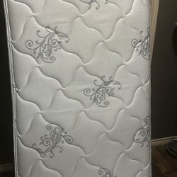 2 Twin Mattresses And A Day Bed 