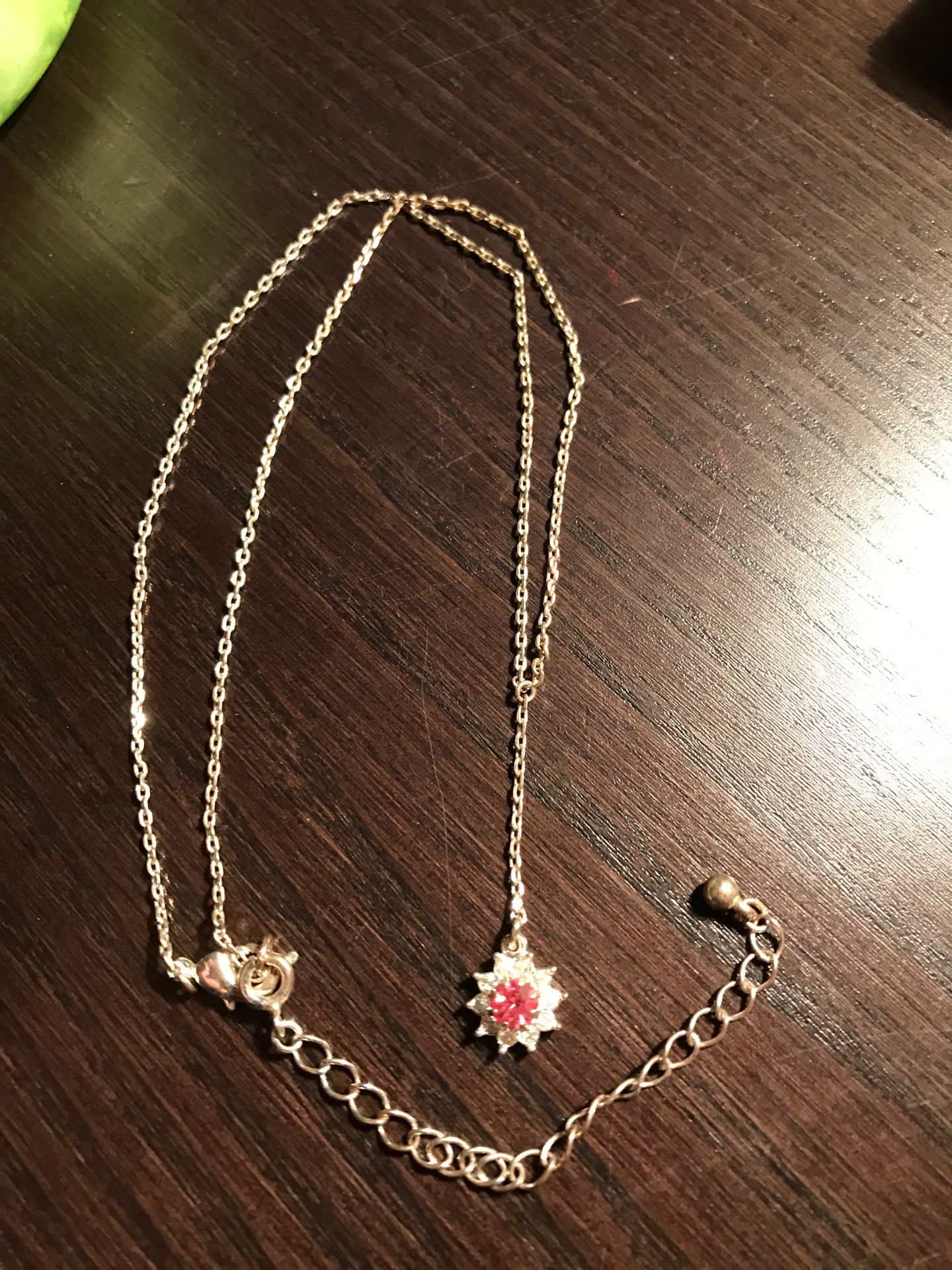 Silver plated pink star necklace from Avon company-$3