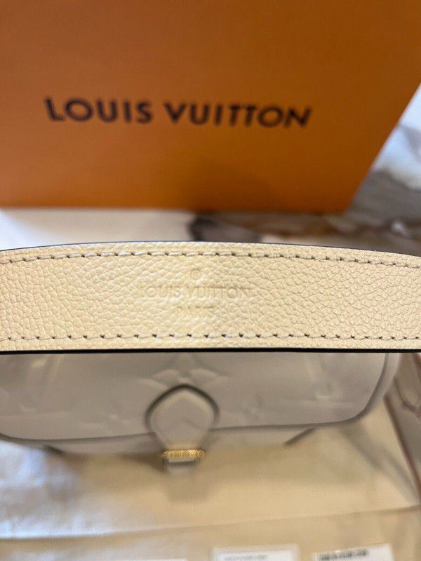 Authentic Louis Vuitton Diane Handbag in Cream Empreinte Leathe