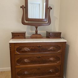 Dresser. Antique Dresser with mirror on Wheels 