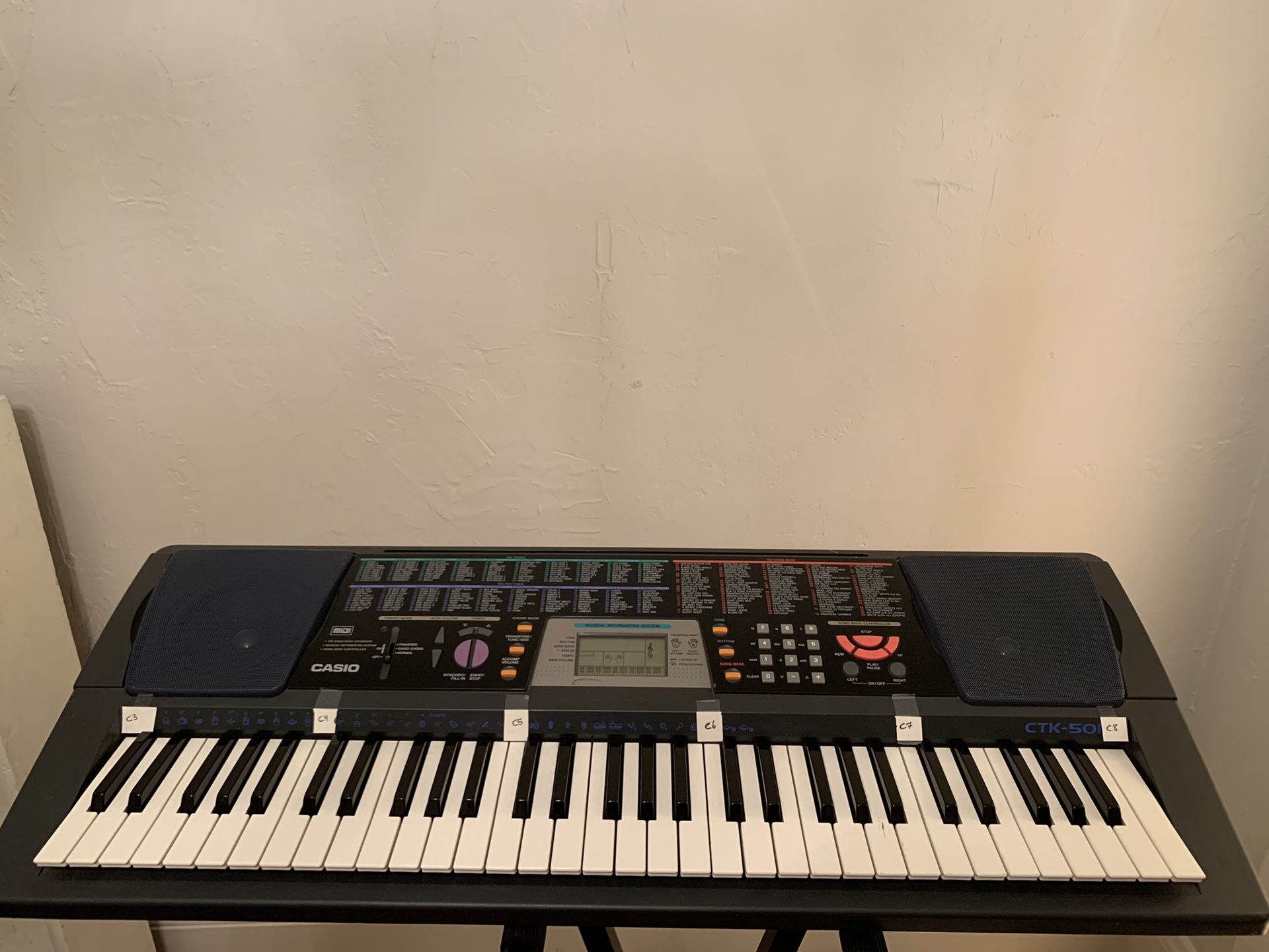 Casio CTK-501 electronic keyboard with accessories