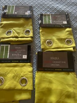 4- pc set blackout grommet panels in yellow, 54in x 84in. 4 panels. #blackout #grommet. Lime green. One of them has a very small tear as shown in the