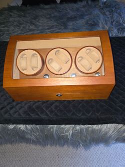 Mechanical wristwatch winder