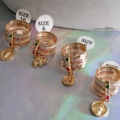 Weekly ring in 3golds with image of the Virgin,Elephant,Sain Benedict in Gold plated