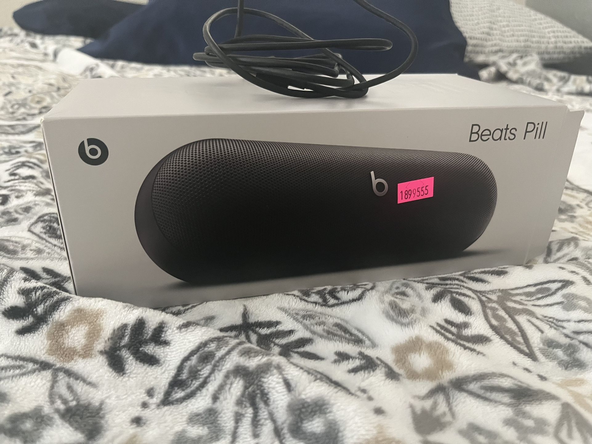 Beats Pill And AirPods Pro