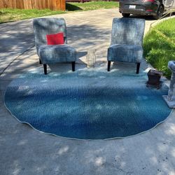Round Rug And Two Chairs 