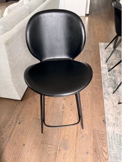 Black faux leather bar stool