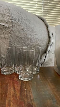 4 clear drinking glasses