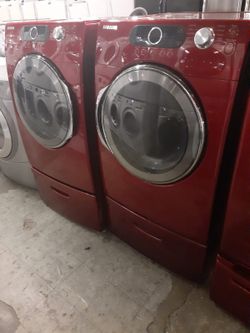 Samsung front load washer and dryer set with pedestal working perfectly with 4 months warranty