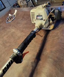Echo weedeater curved. Works, but vibrates when accelerating