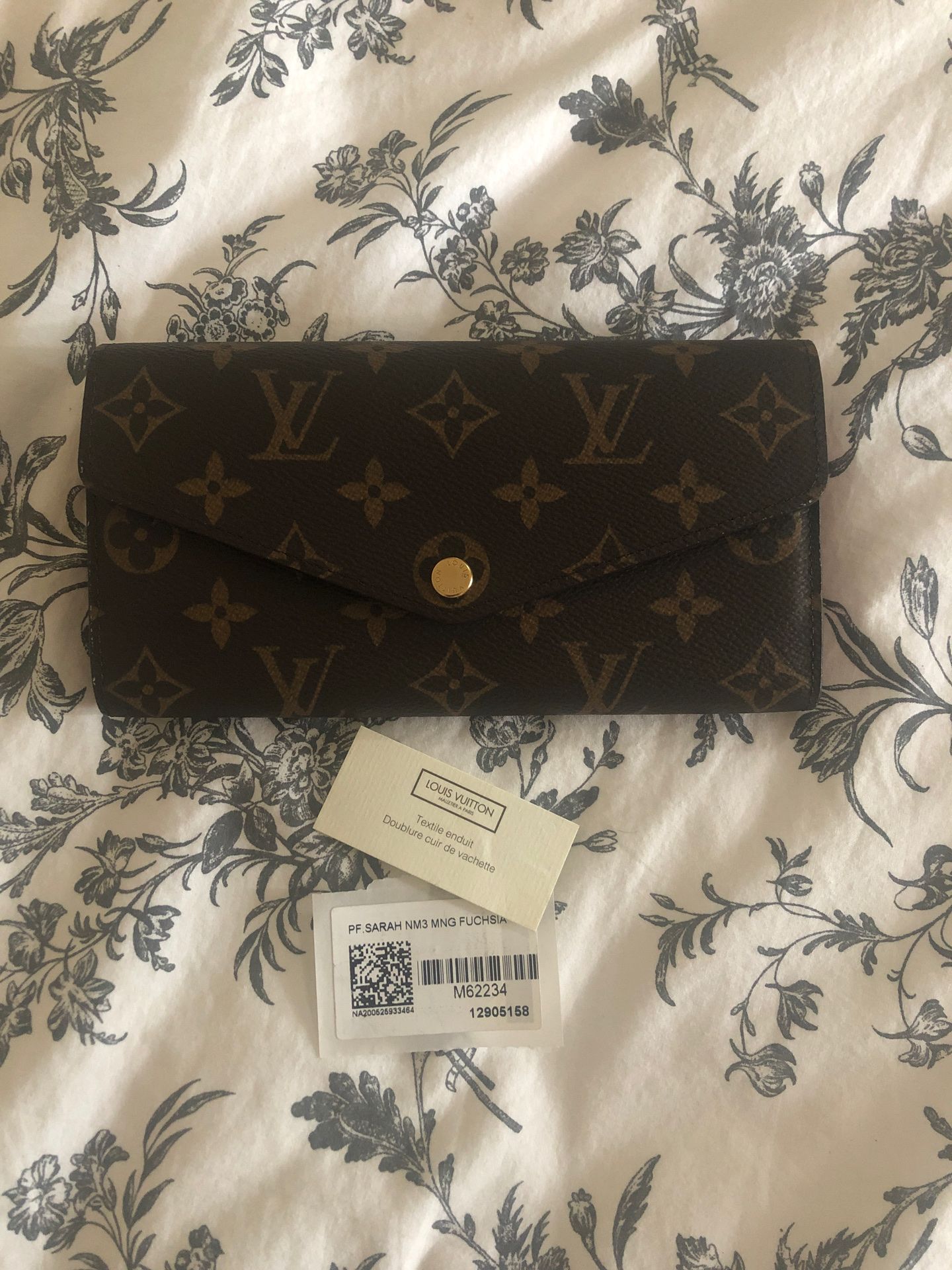 Authentic Louis Vuitton Sarah Wallet in Monogram Fushia
