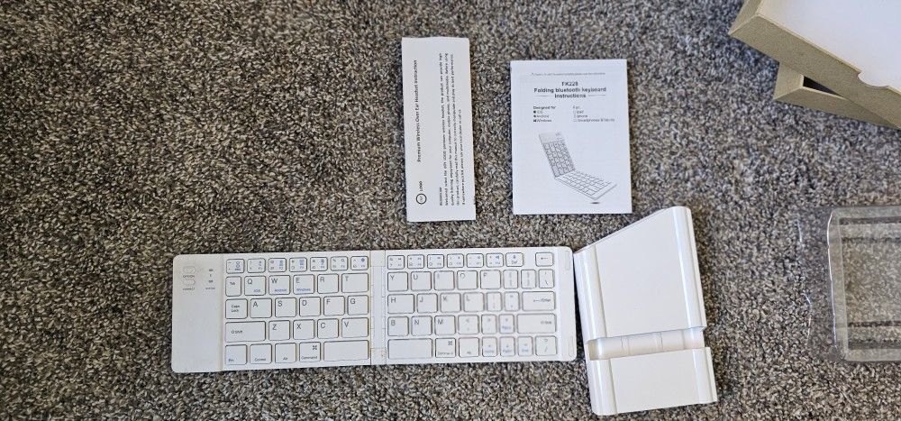 IKOS Folding Bluetooth Wireless Keyboard Slim Pocket Portable Travel Foldable Full Size Keyboard with Stand Holder