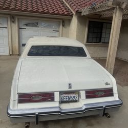 Buick Riviera 1983 white crush velvet interior