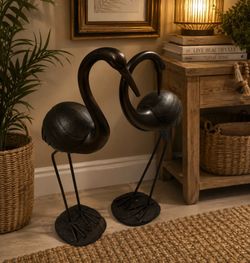 bronze-finished crane statues