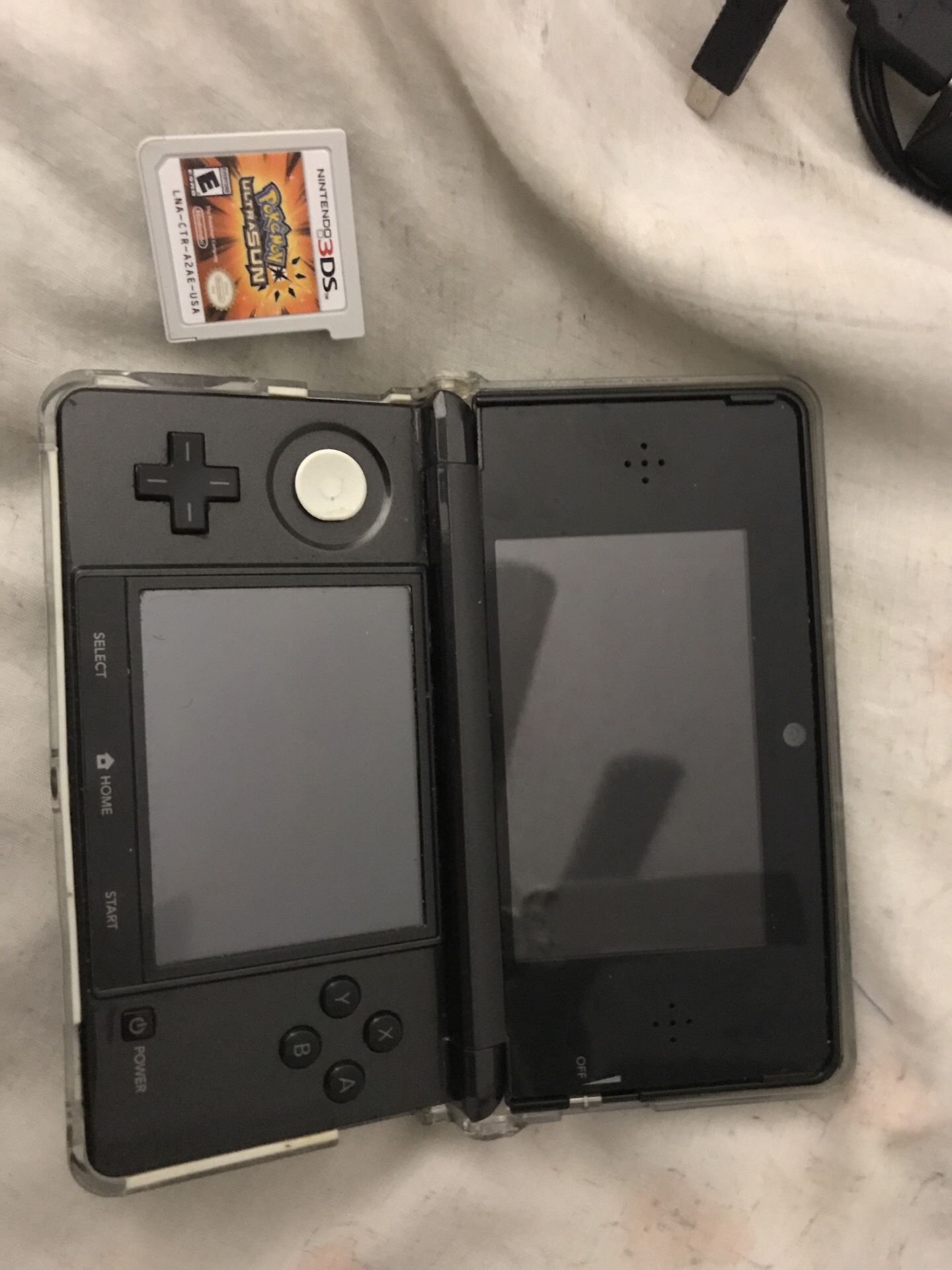 Nintendo 3DS Pokémon ultra sun carrying case and charger.