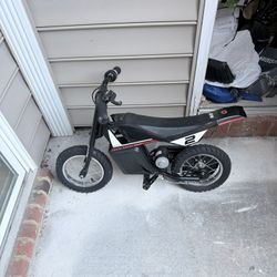 Little Boys And Girls Dirt Bike And Paddle Bike