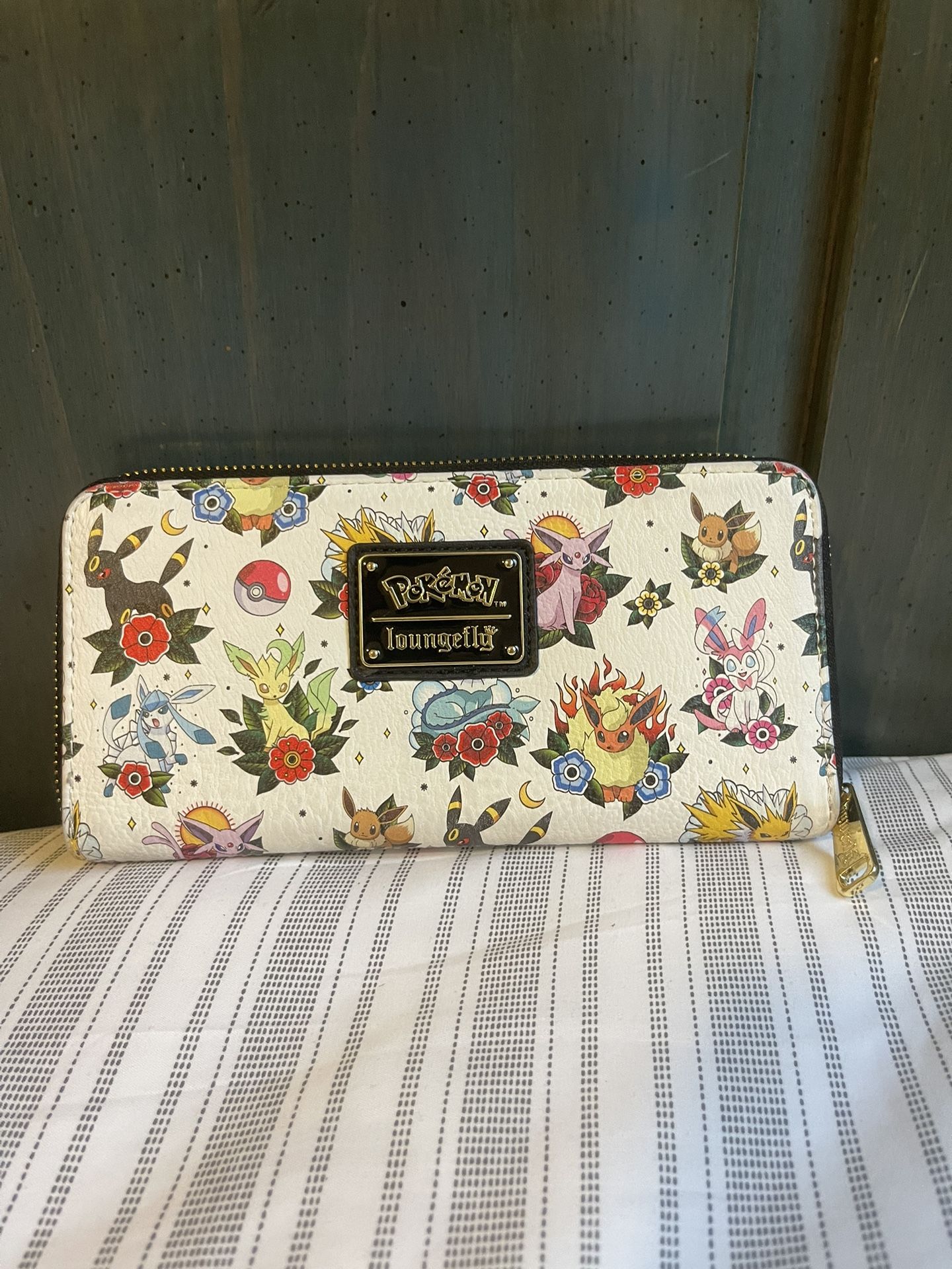 eevee evolution tattoo sleeve wallet loungefly