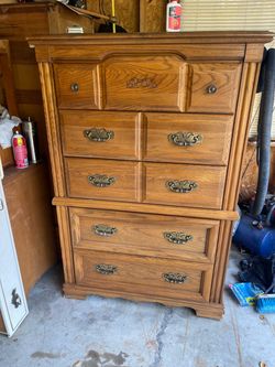 It’s a broyhill  five drawer tall chest