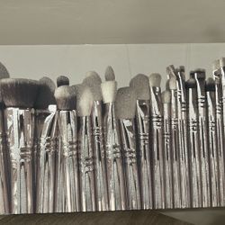 Sparkling Silver Makeup Brushes On Canvas