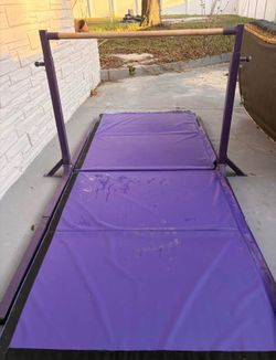 Adjustable high beam bar with mat