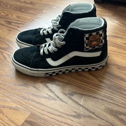 Vans Black and White High-Tops with Graphic Details