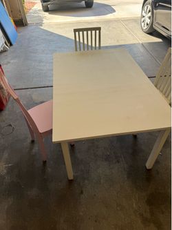 Wooden kids table with 3 chairs