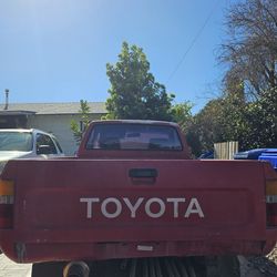 1989 Red Toyota Pickup Truck