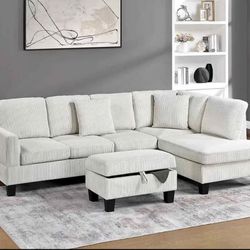 corduroy Sectional Sofa with storage ottoman and 2 accent pillows.