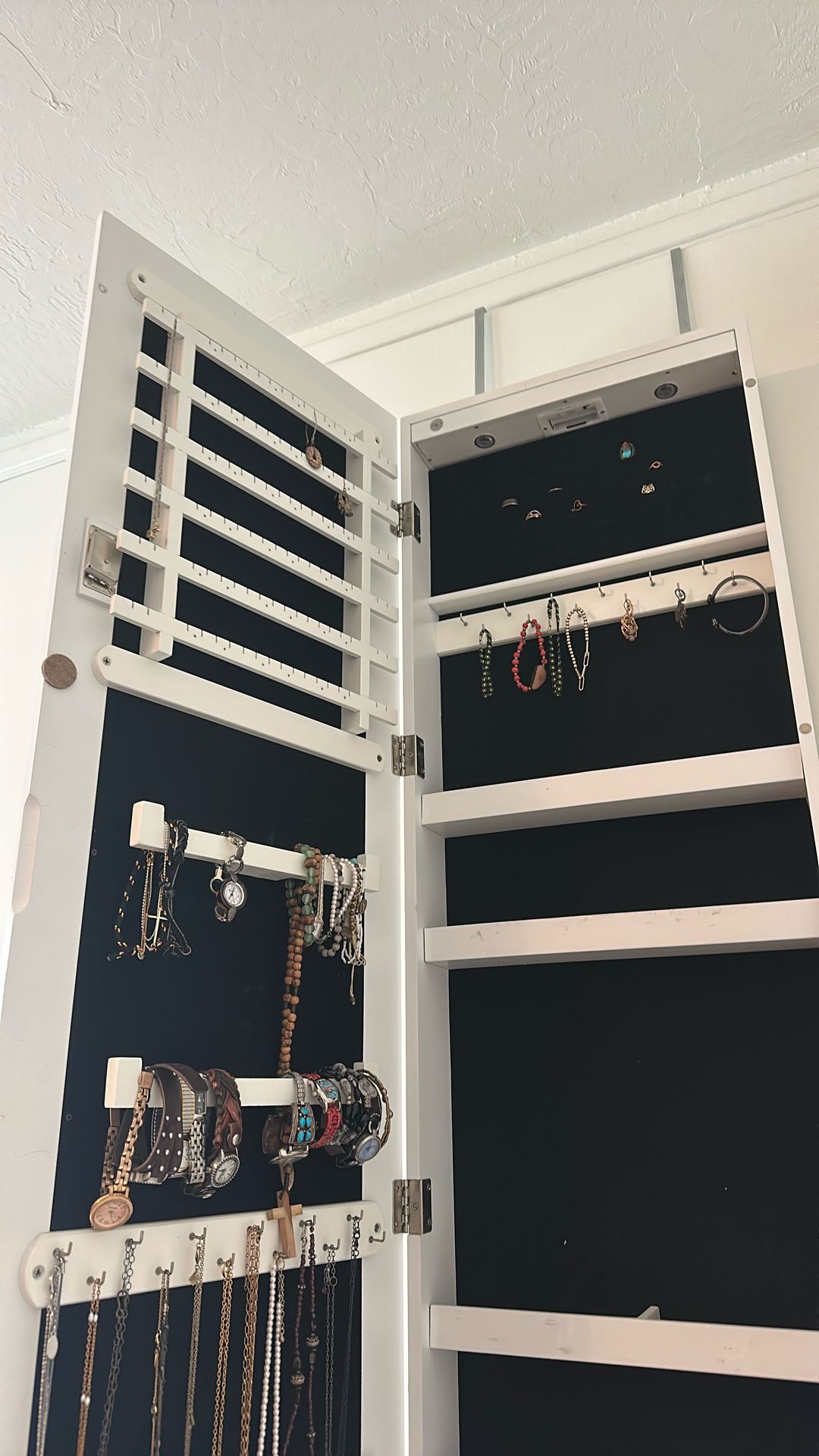 Jewlery  Box Hangs Over The Door 