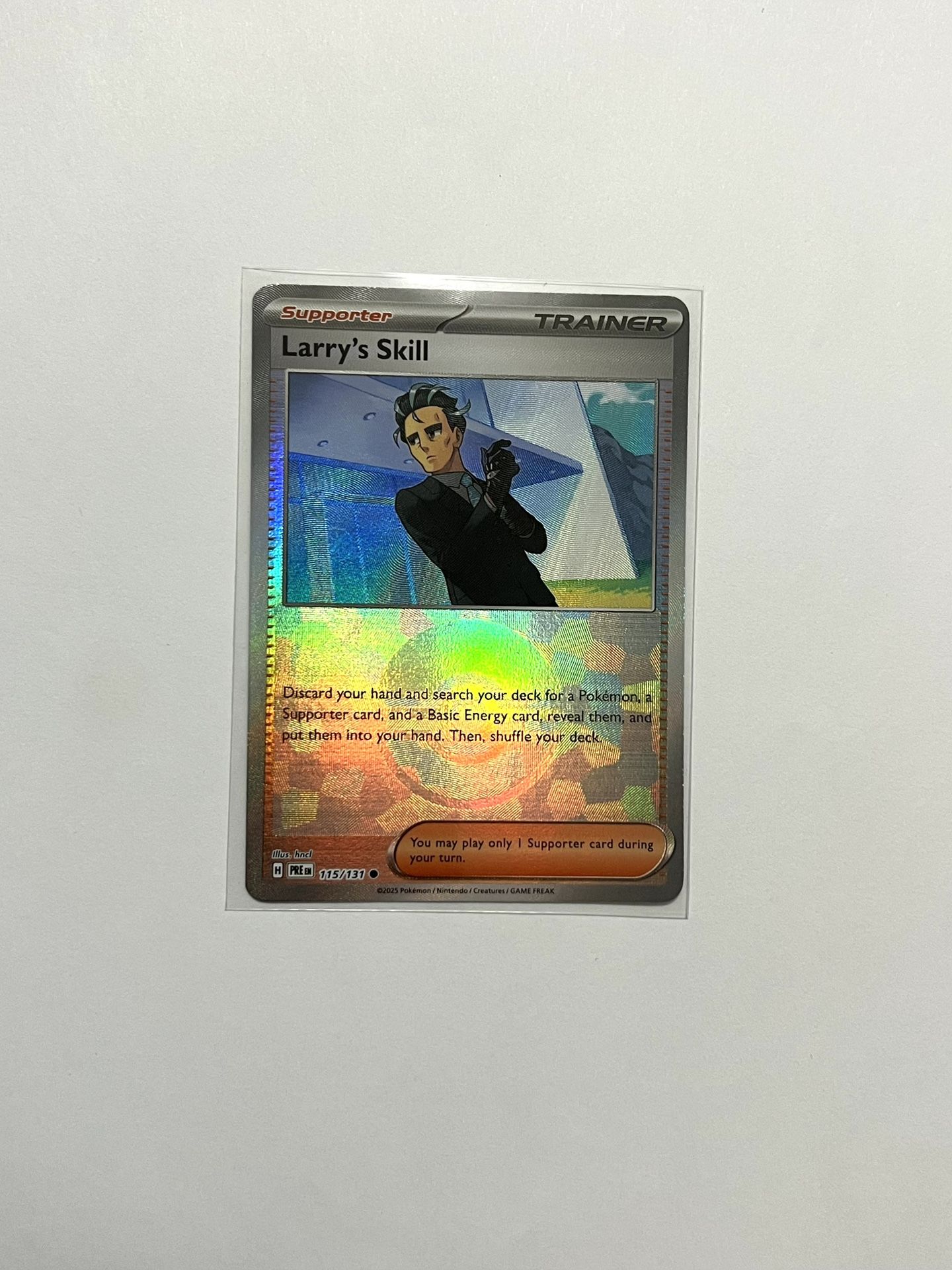 Larry's Skill (Poke Ball) - 115/131 - Pokemon Prismatic Evolutions M NM