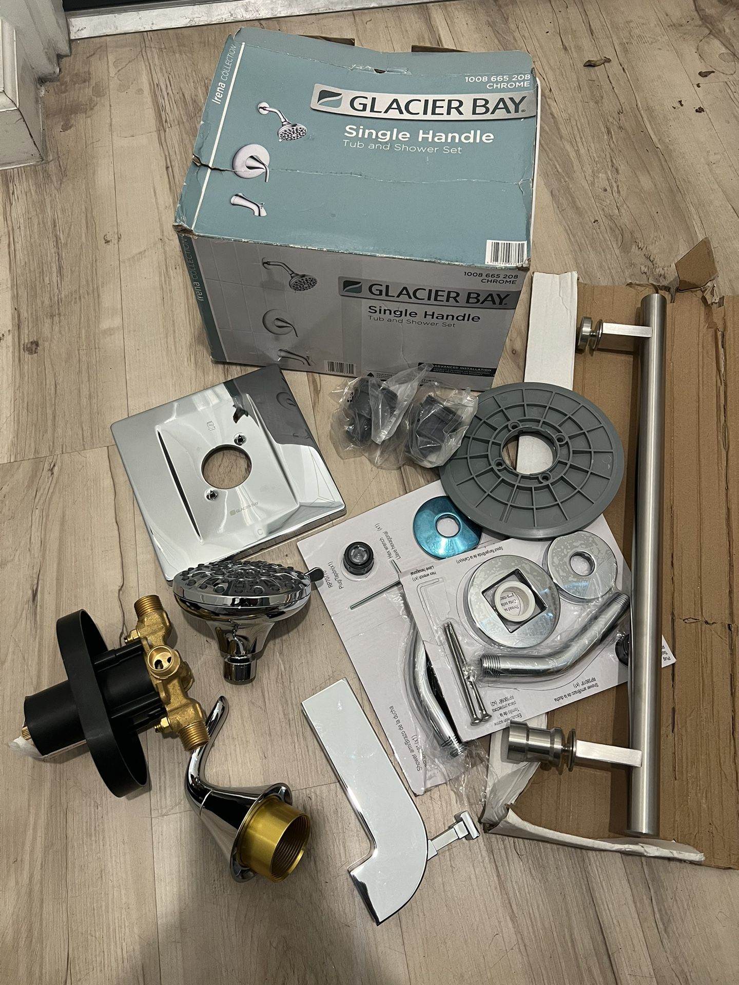 GLACIER BAY SINGLE HANDLE TUB AND SHOWER SET 6 DIFFERENT SPRAY MODES EVERYTHING BRAND NEW ONLY MISSING FACE PLATE CAN FIND ONLINE ALSO COMES WITH EXTR