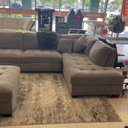 Gray fabric sectional couch by Thomasville