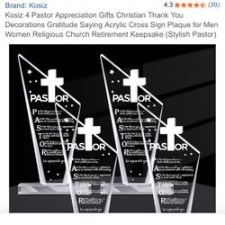 Set of 4 clear LED acrylic pastor appreciation plaques. Each features a cross silhouette and engraved 'PASTOR' text with decorative stars. Sleek, tran