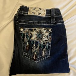 Dark wash, boot cut miss me jeans