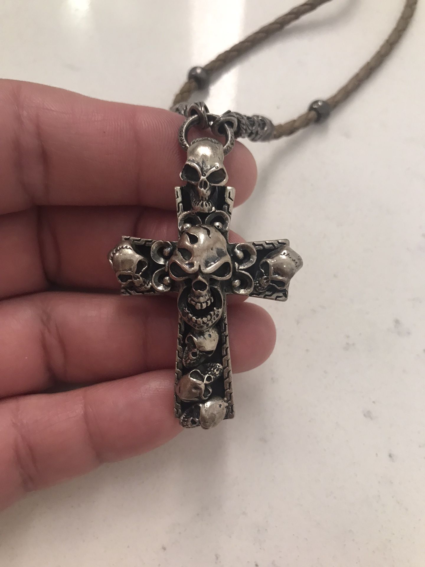 TJ Silversmith Skull Cross Designer Piece With Handmade Leather Necklace With Silver Accents Around The Rope Chain