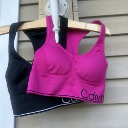 2 Calvin Klein Performance Sports Bras. Black is Small, Pink is XS. worn once