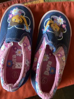 Selling Dora little girls shoes.