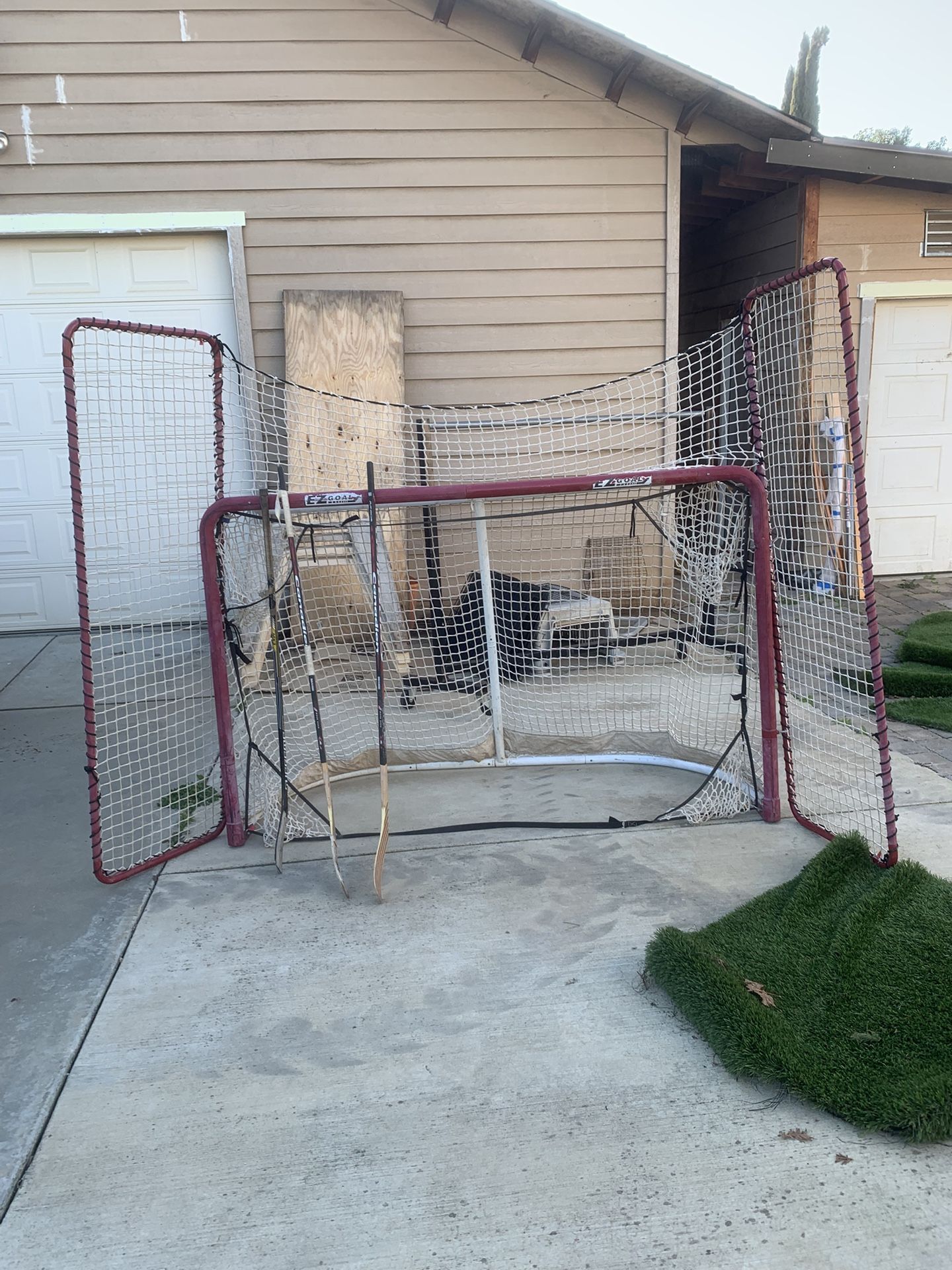 Hockey Goal/ Hockey Sticks