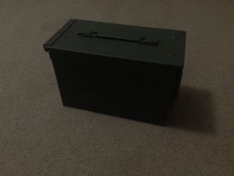 Large green waterproof storage cases.