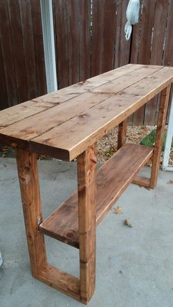 Rustic bar with removable bottom shelf read below