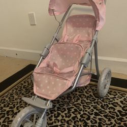 Doll stroller, only the stroller is for sale, not the dolls.
