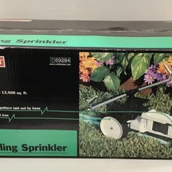 New In Box. Craftsman Traveling Sprinkler. Metal. For Large Yards.